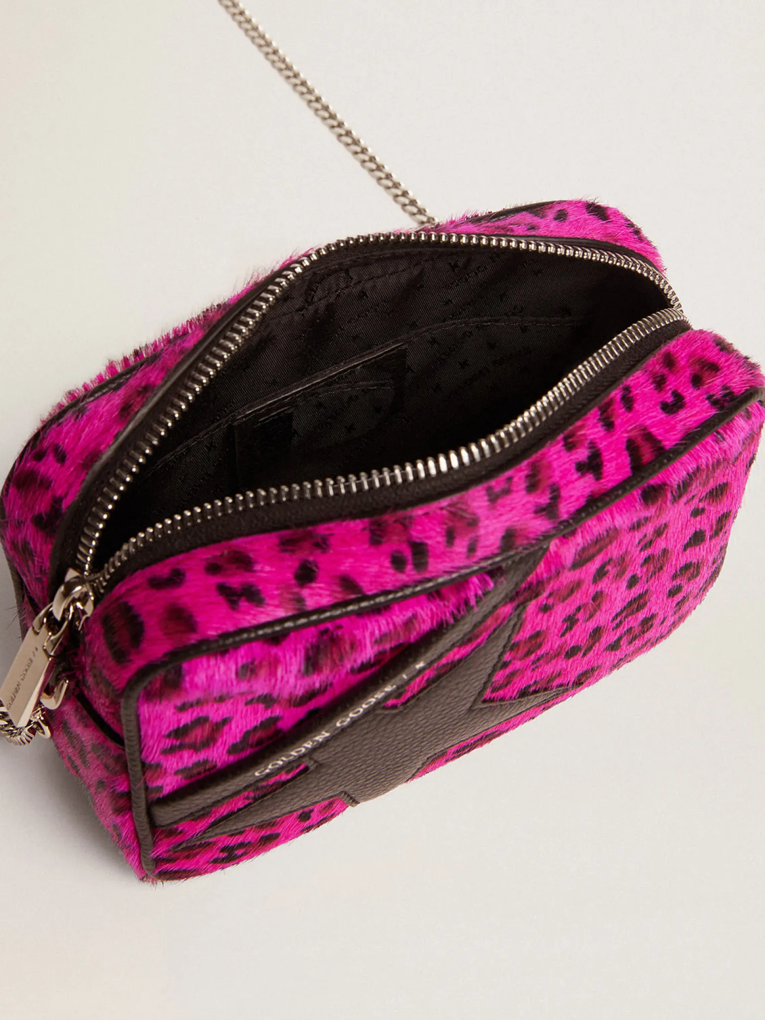 Shop Bolsa Mini Star de couro cavalinho com estampa de leopardo fúcsia e estrela de couro preta MULHER Minibolsas|Bolsas tiracolo