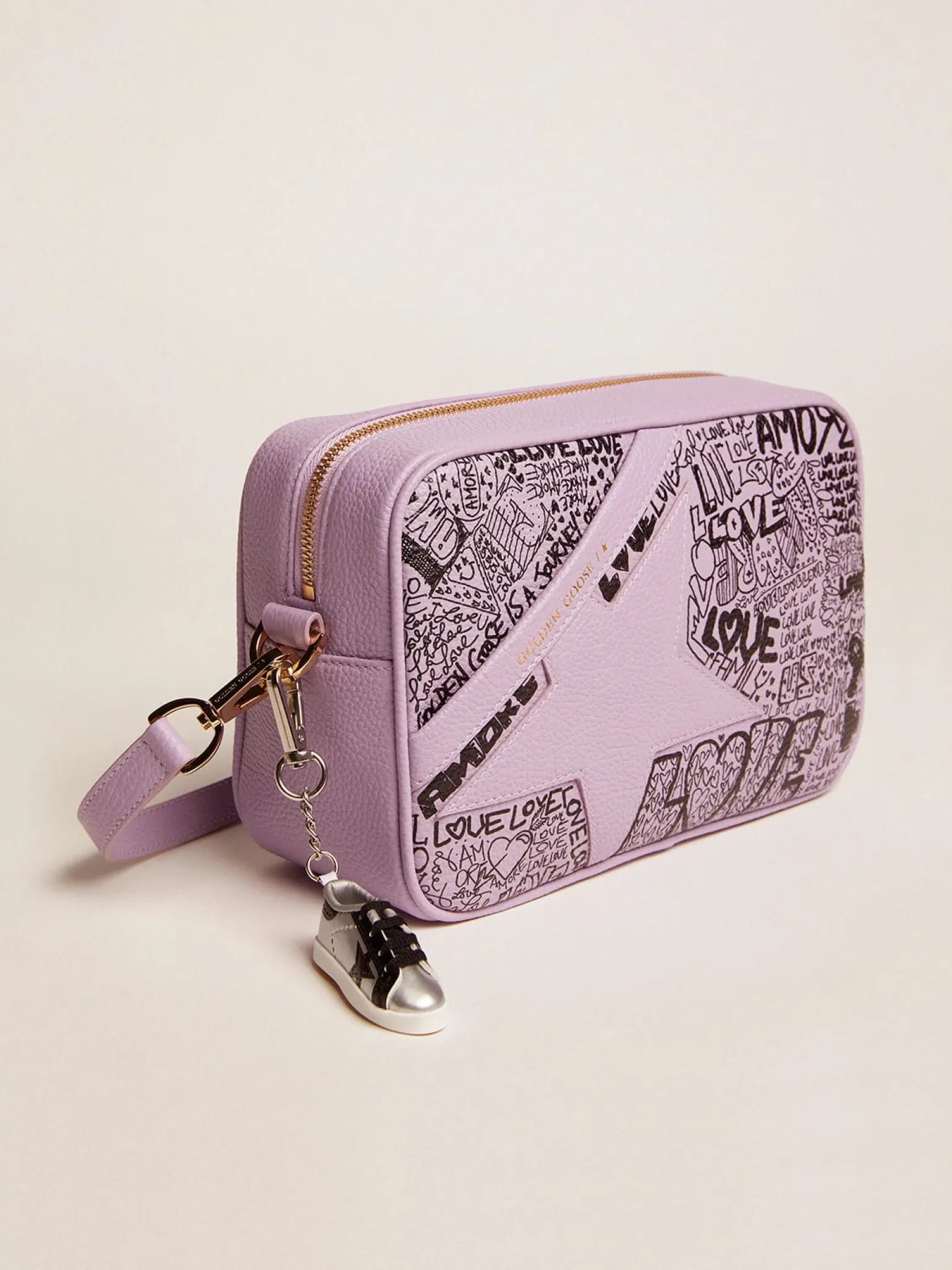 Clearance Bolsa Star de couro martelado lilás com estrela de couro tom sobre tom e estampa de grafite preto all-over MULHER Bolsas tiracolo