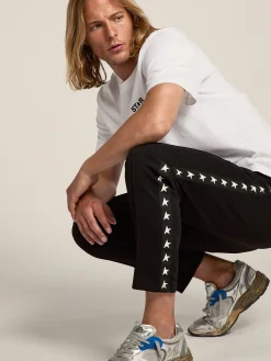 Discount Calça de jogging masculina preta com estrelas brancas nas laterais Jeans e calças
