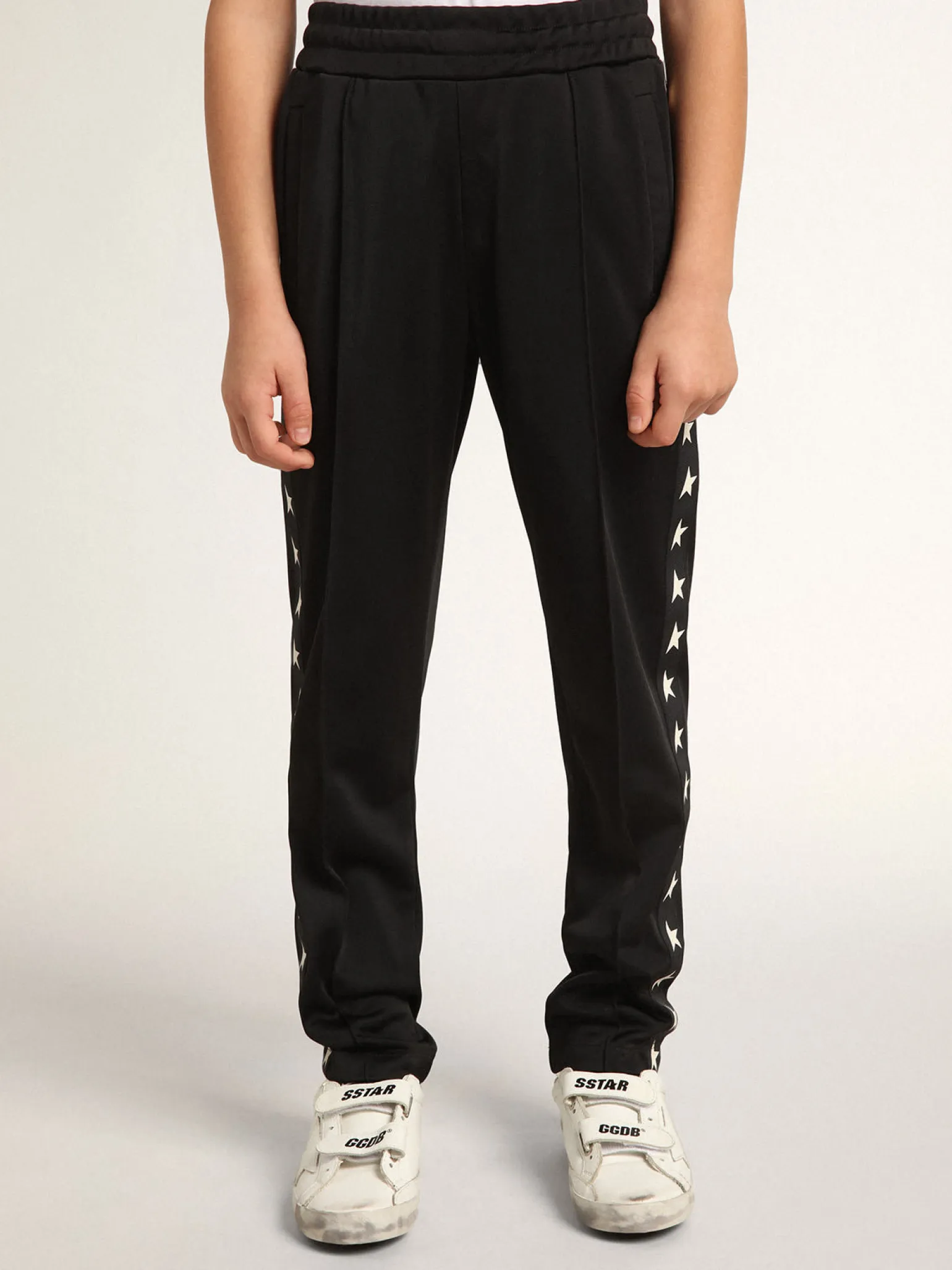 Clearance Calça de jogging preta com estrelas brancas em contraste Bottoms (4-12 years)|Bottoms (4-12 years)